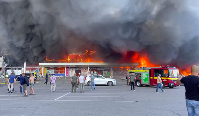 Shopping mall gutted in massive flames